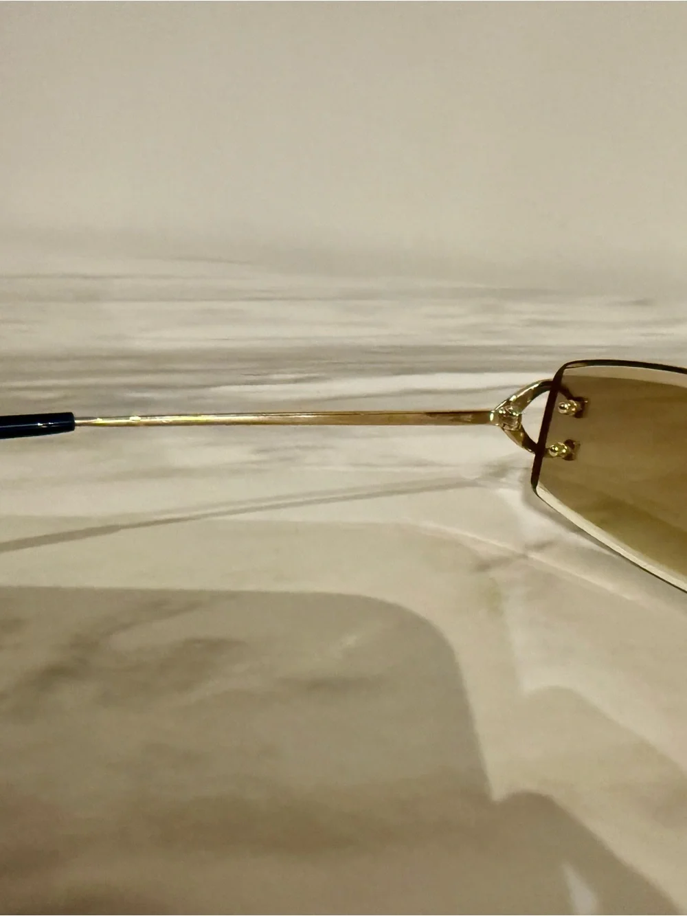 Cartier Rimless Sunglasses in Gold with Brown Tinted Lenses